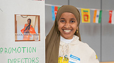 Student smiling for a photo at the Multicultural Mixer