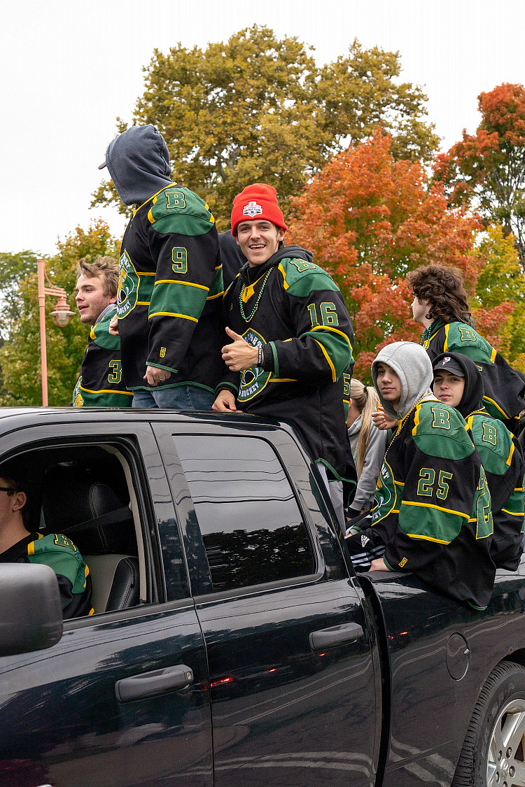 Men's Club Ice Hockey members at the Homecoming Parade