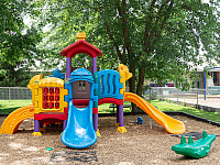 A playground with a slide outside