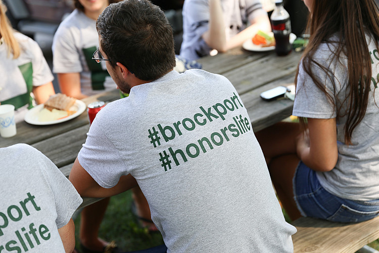 Student wearing an Honors College t-shirt