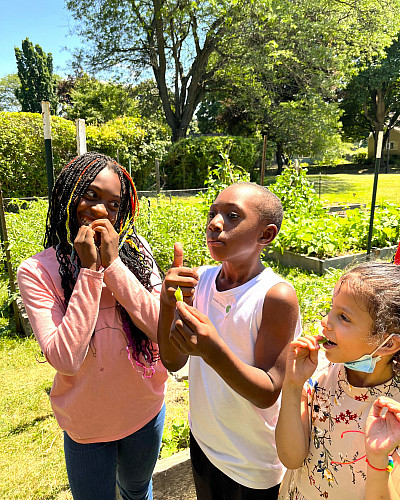 Children talking outside in a field