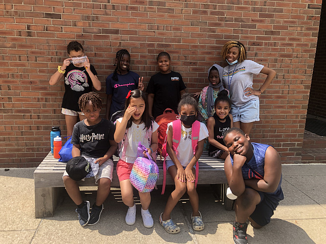 Group of children and staff posing for the camera