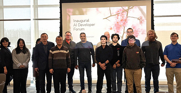 Invited speakers, student presenters, and some faculty attendees at the Al Development Forum.
