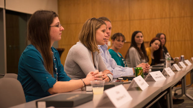 Students at a table during an event