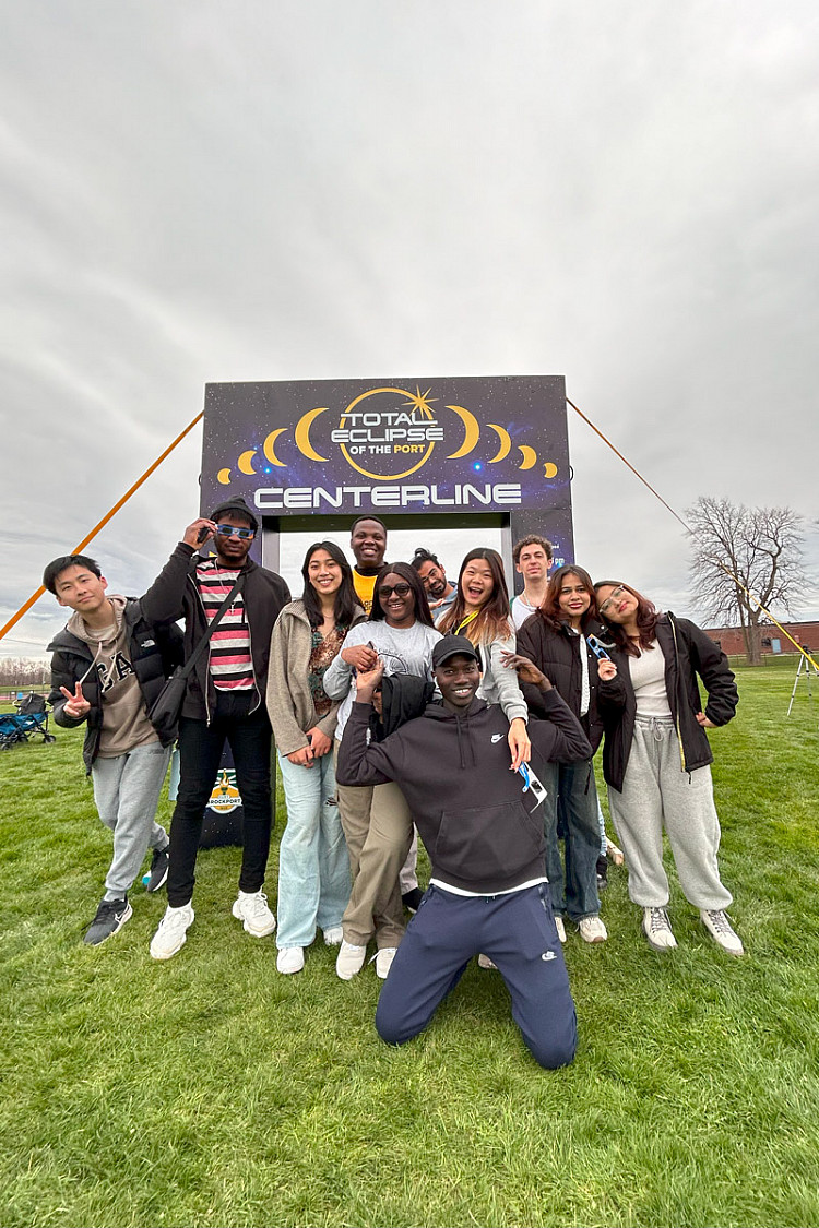 Students taking a photo on the Center Line
