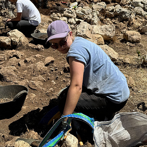 Evelyn excavating in the patio of SPU 7 at Torre d'en Galmés. Photo by Dr. Alex Smith.