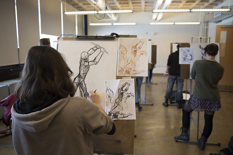 students drawing in a classroom
