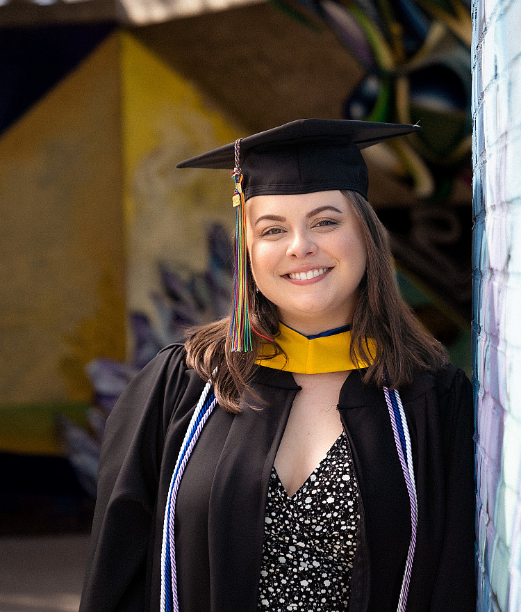 Graduate student in cap and gown