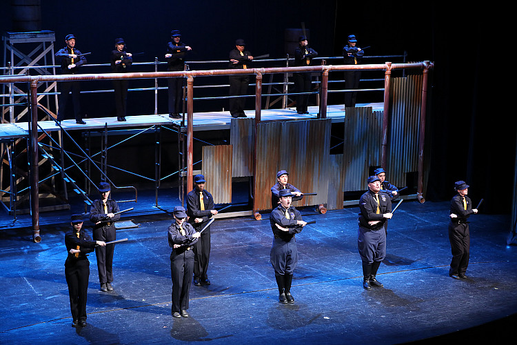 Students performing on stage