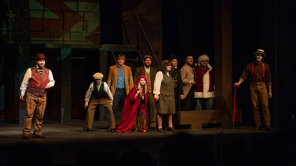 Students in the middle of a performance on stage