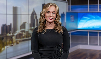 Victoria McIlvain inside news station.