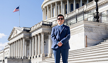 Allan Dumas standing in front of the US Capitol building.