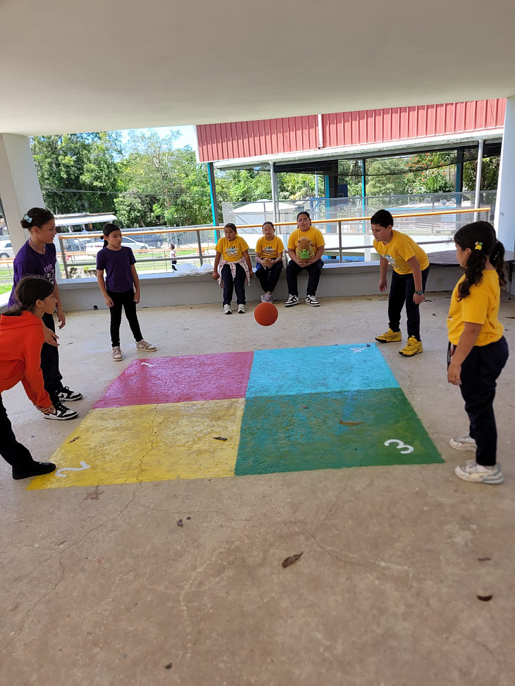 Children playing Four Square