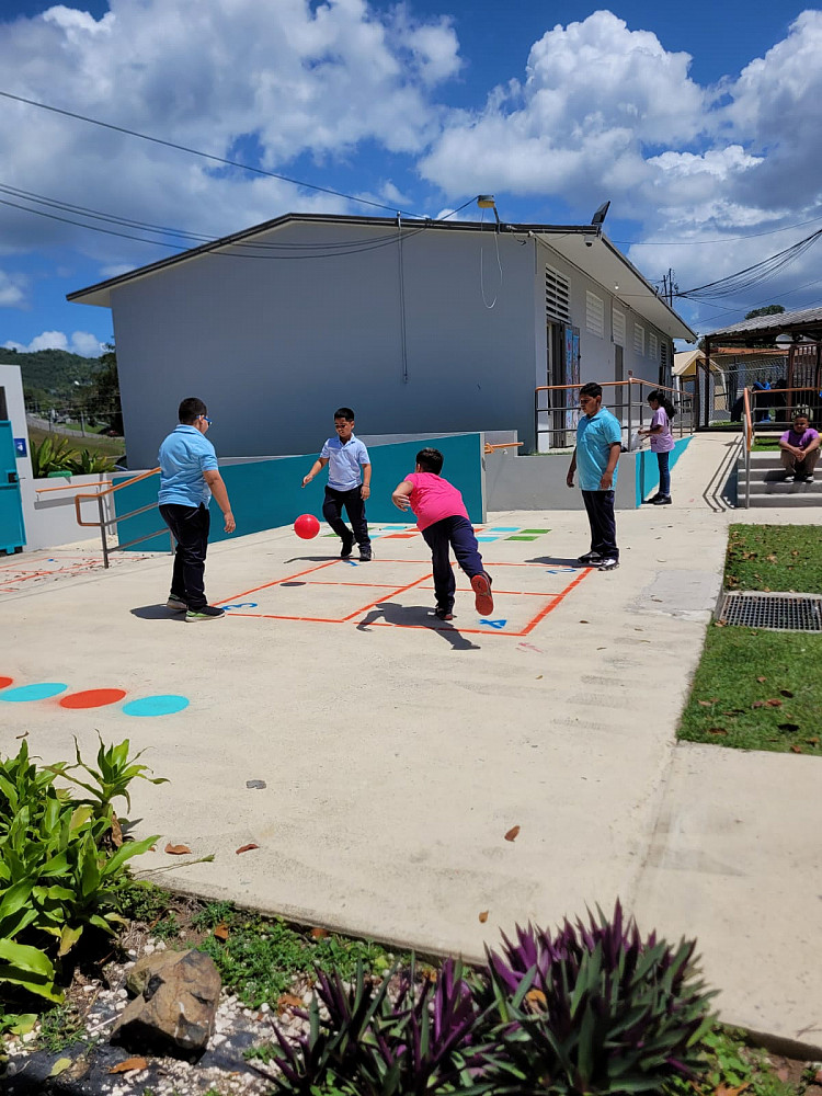 Children playing Four Square