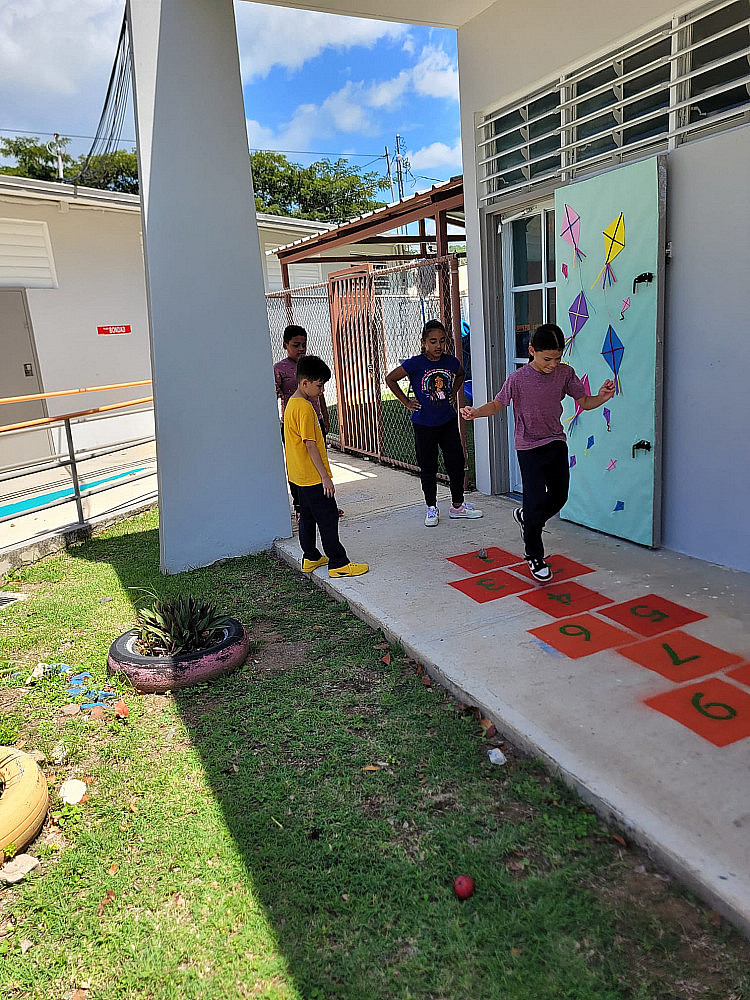 Kids doing hopscotch
