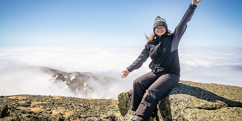 Patricia Hutton at the summit of Mt. Washington